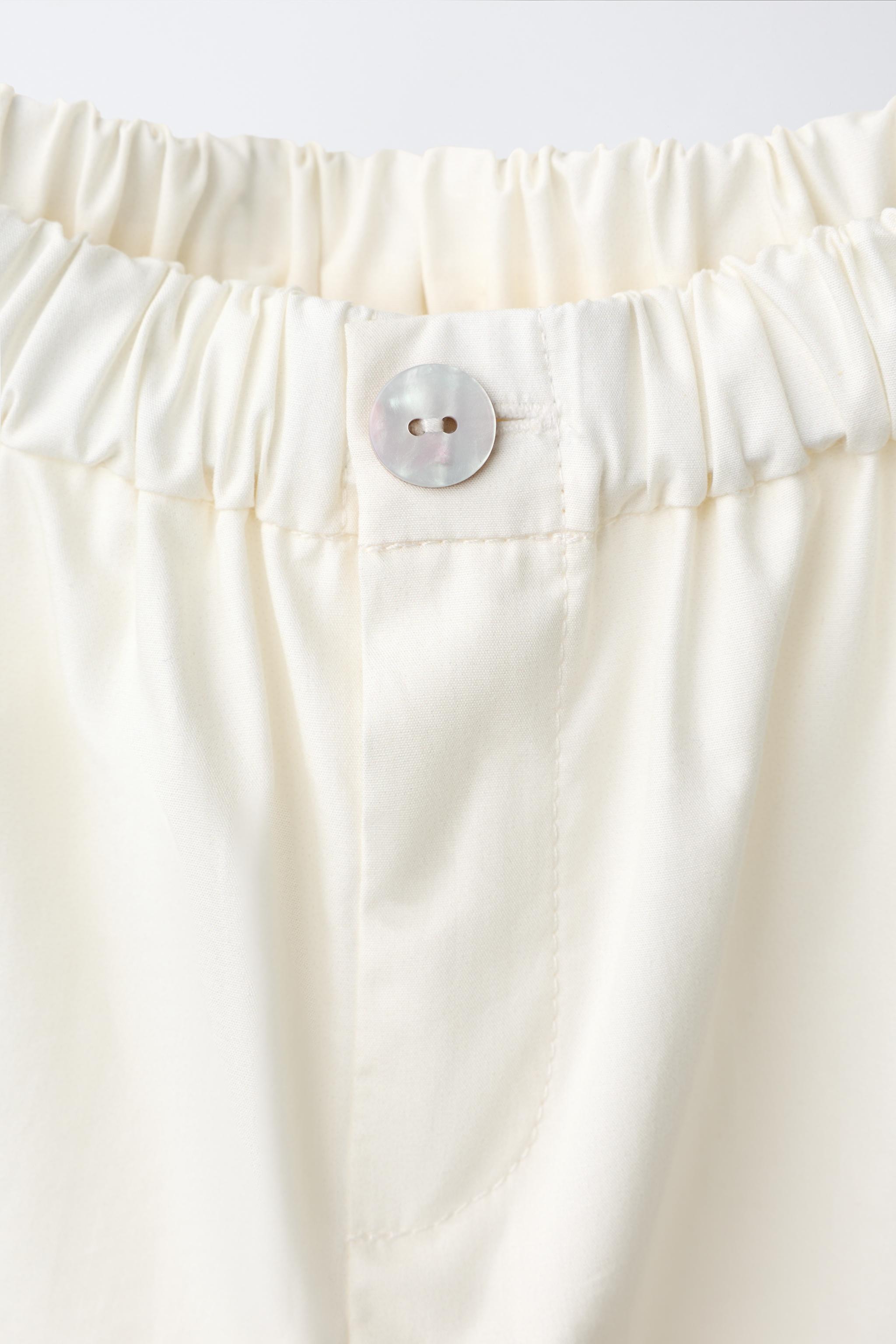 PANTALON LARGE À IMPRIMÉ FLEURI
